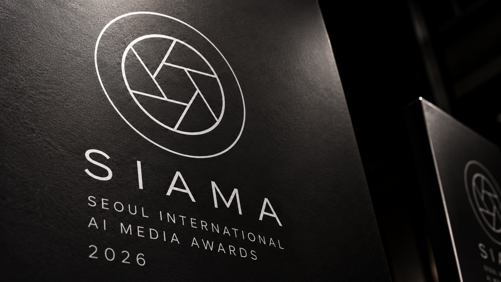 SIAMA aperture logo on festival signage